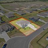 Aerial photograph of a Lockhart property with the lot boundary outlined in red