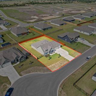 Aerial photograph of a Lockhart property with the lot boundary outlined in red